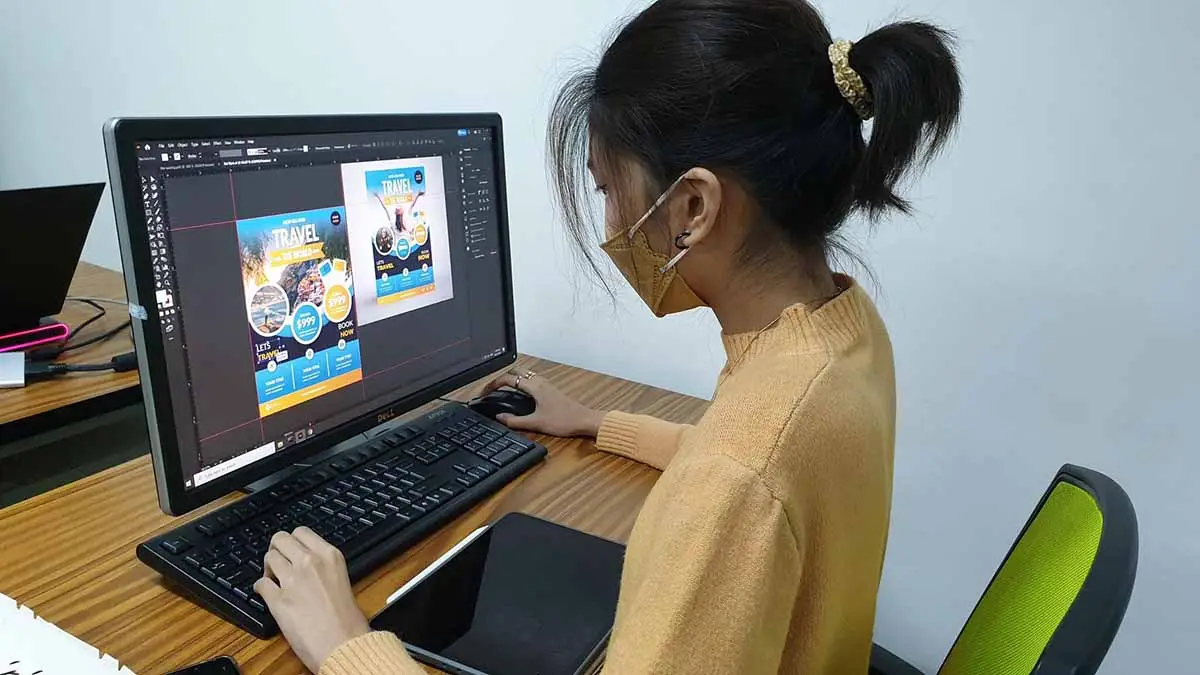 Students learning Adobe Illustrator basics in a classroom in the Philippines